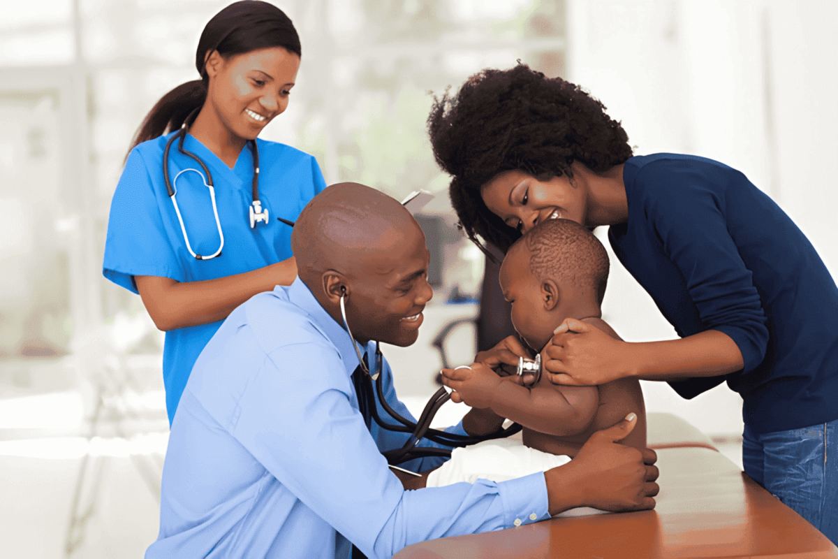Doctor with patient at Ngumba Hospital